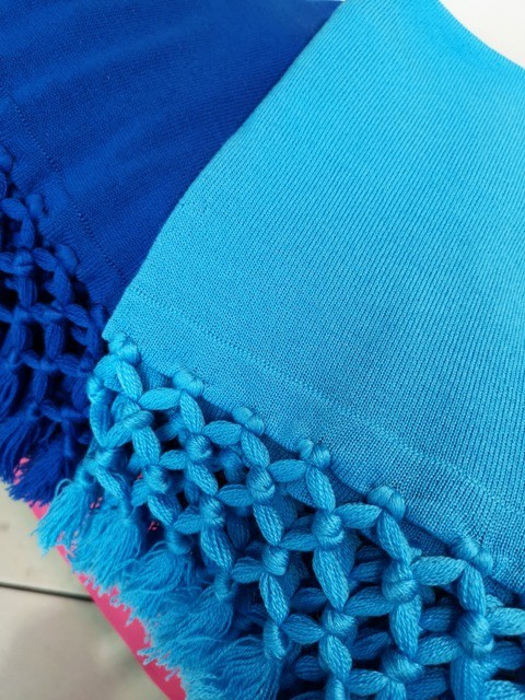 stola con frangia nodi